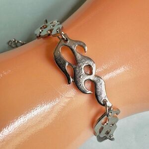 Silver tone Flame Link Bracelet